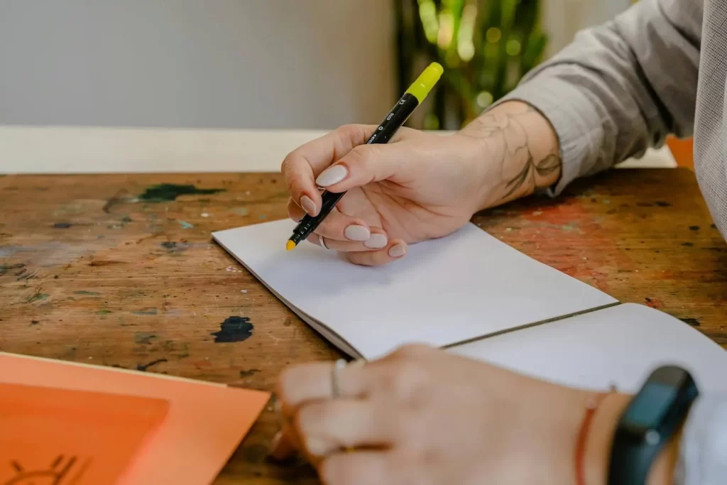 A person using a marker pen